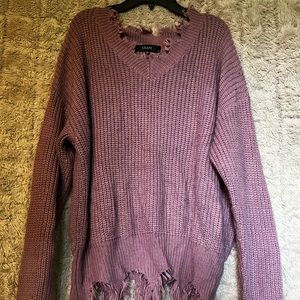 Distressed knit sweater